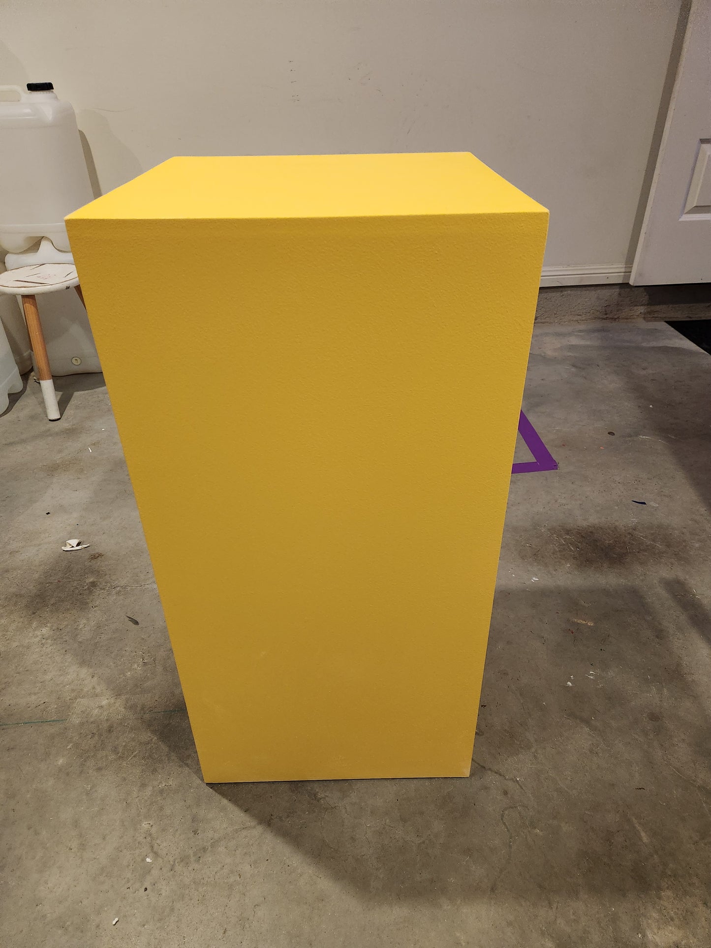 Yellow square plinth